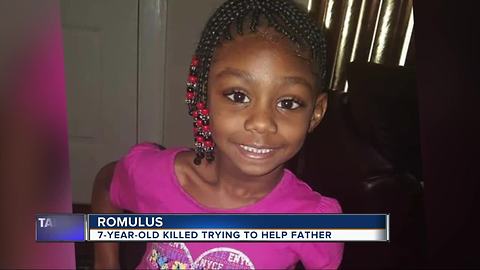 7-year-old killed trying to help father