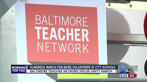 Hundreds march for more volunteers in City schools