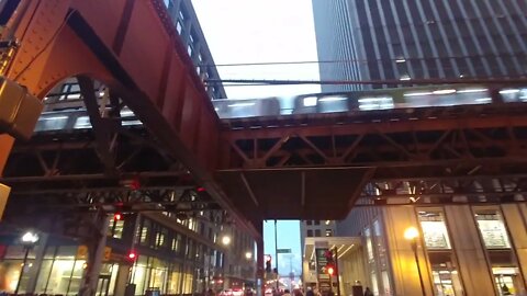 On the street, looking up at Chicago's "L" train