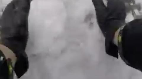 Dutch Cop Has Fun In A Snowball Fight