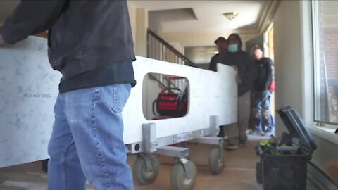 Group of contractors, military organizations, volunteers complete construction projects for military widow