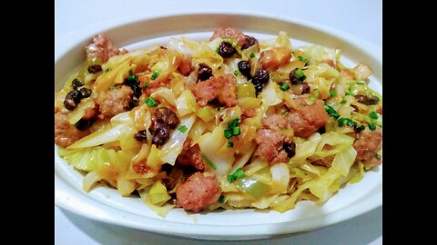 SAUTED CABBAGE WITH BACON SAUSAGE AND RAISINS