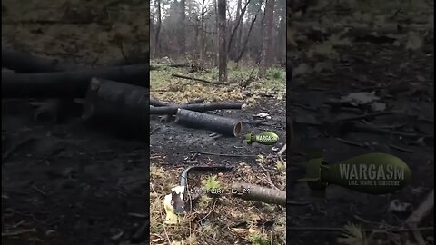 Armored vehcile made unrecognizable from artillery hit