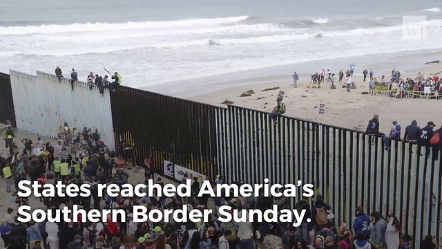 ‘Caravan’ Slams Into Border Fence, Cheers ‘Gracias, Mexico’ As They Climb Over