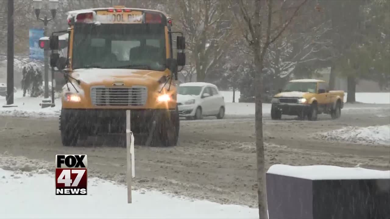 Lansing drivers navigate slick roads