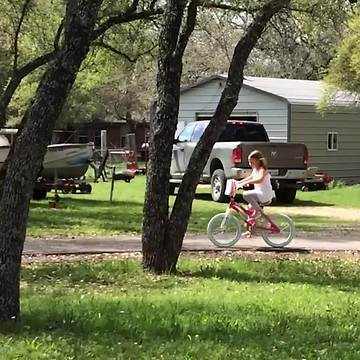Little Girl On A Bike Crashes Into Tree