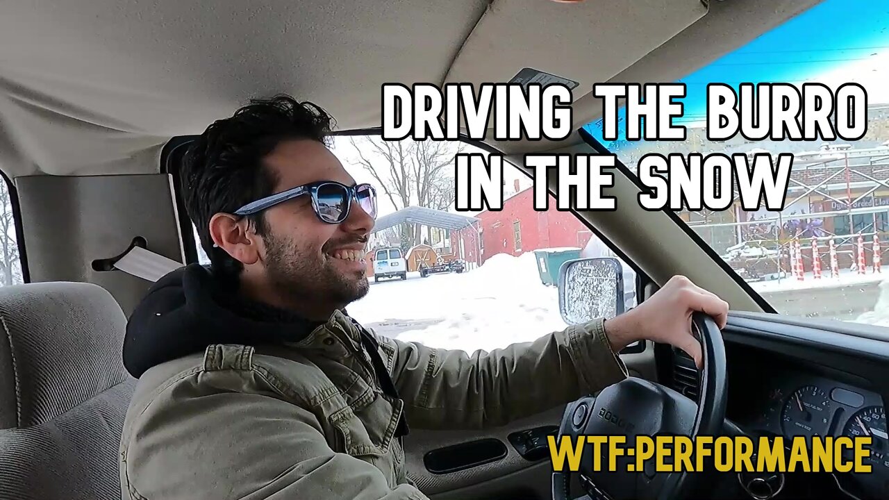 Driving the Burro in the snow on bald tires.
