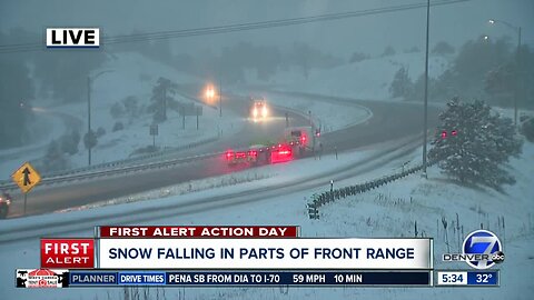 Snow falling around Front Range