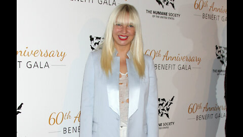 Sia says parenting is both painful and rewarding