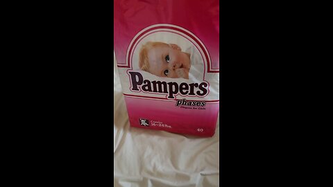 vintage pink package of pampers plastic diapers