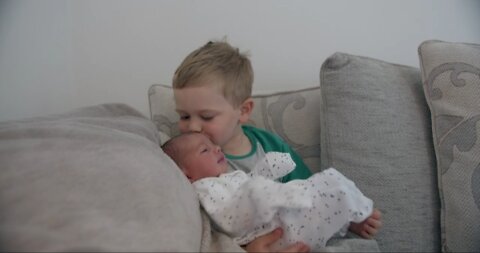 Brother meet his sister for the first time.