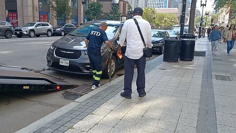 Boston Transportation towing a vehicle parked in the commercial Zone