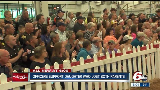 Officers pack Indiana State fair goat show to support daughter of dispatcher who died unexpectedly