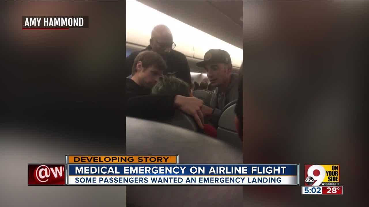 'Hero' helps woman seizing on Cincinnati-bound flight