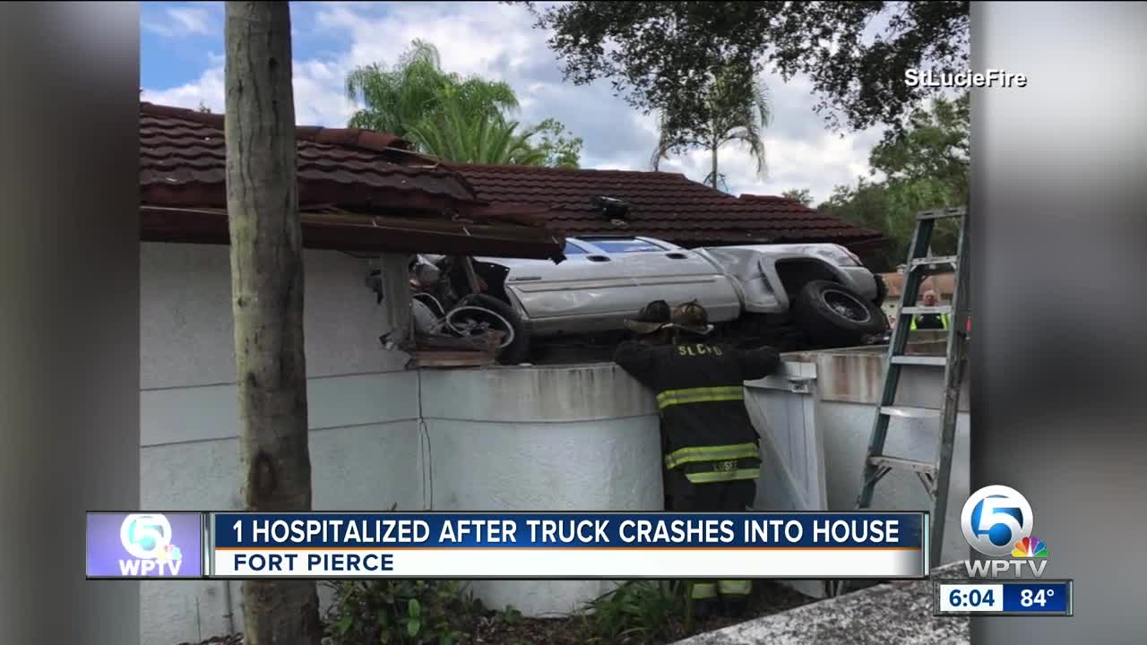 Truck crashes into Fort Pierce house