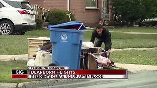 Dearborn Heights residents clean-up after flooding, brace for more rain