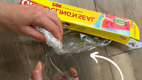 Stuff plastic wrap into glass for this BRILLIANT Christmas idea!