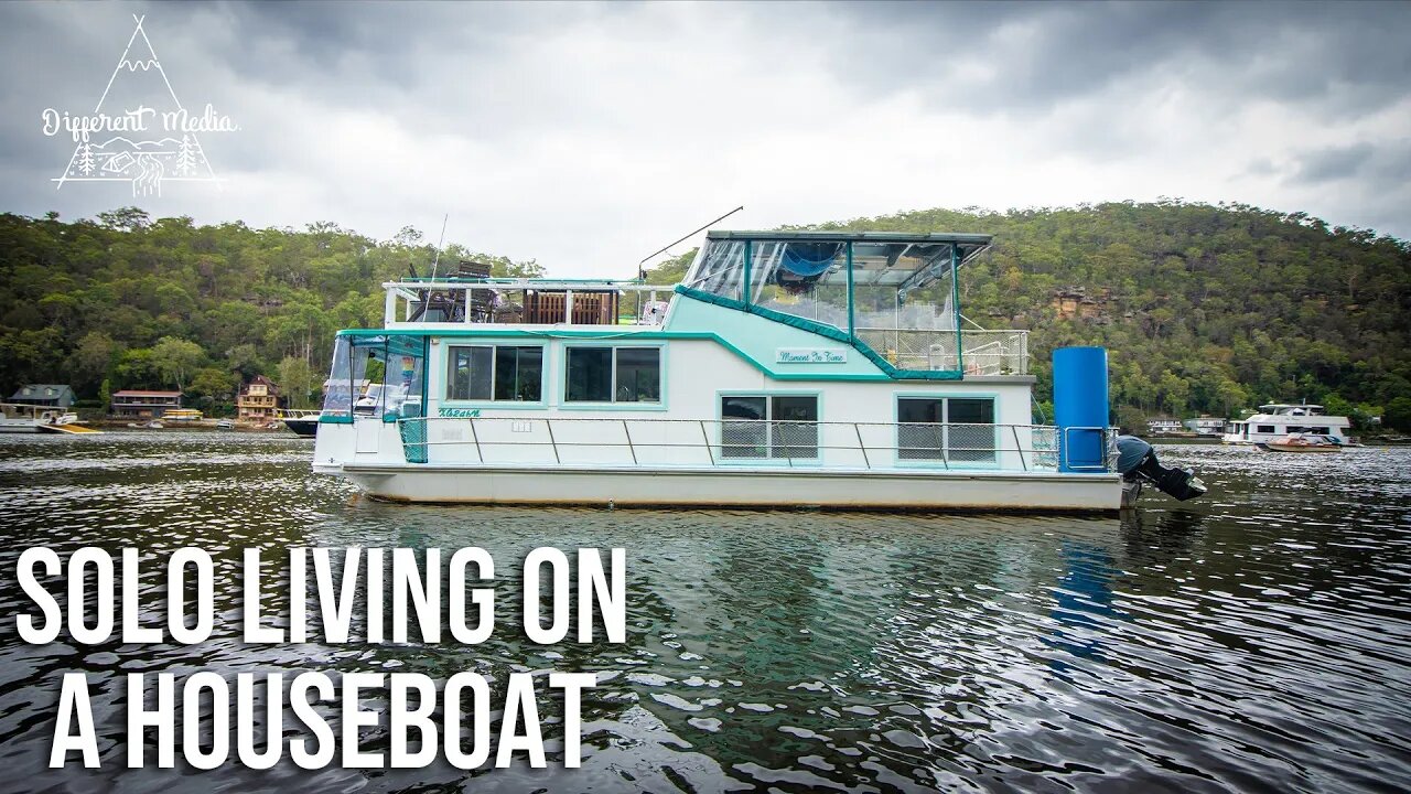 Solo woman lives on houseboat in Australian jungle.