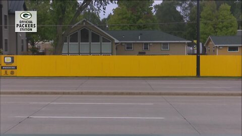 Painting a fence for a good cause