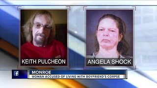 Metro Detroit woman lived with boyfriend's dead body for weeks, police say