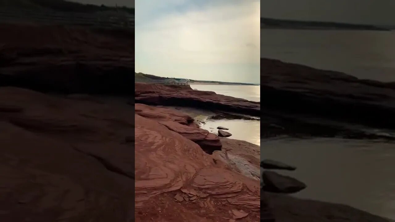 Exploring rocky cliffs at beach