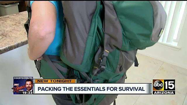 Man teaching others how to make survival bags