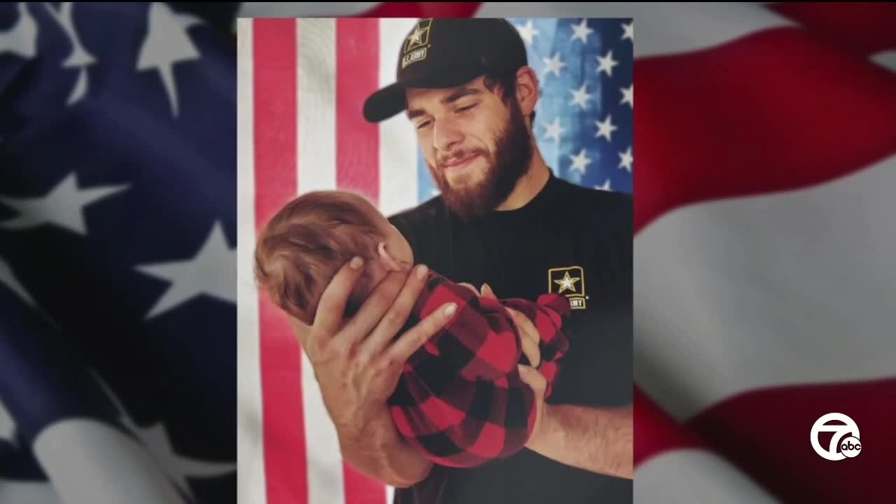 Veterans line highway as body of Michigan soldier killed in Colorado returns home