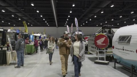 Hundreds of Northeast Wisconsinites eye the latest outdoor technology at Green Bay RV & Camping Expo