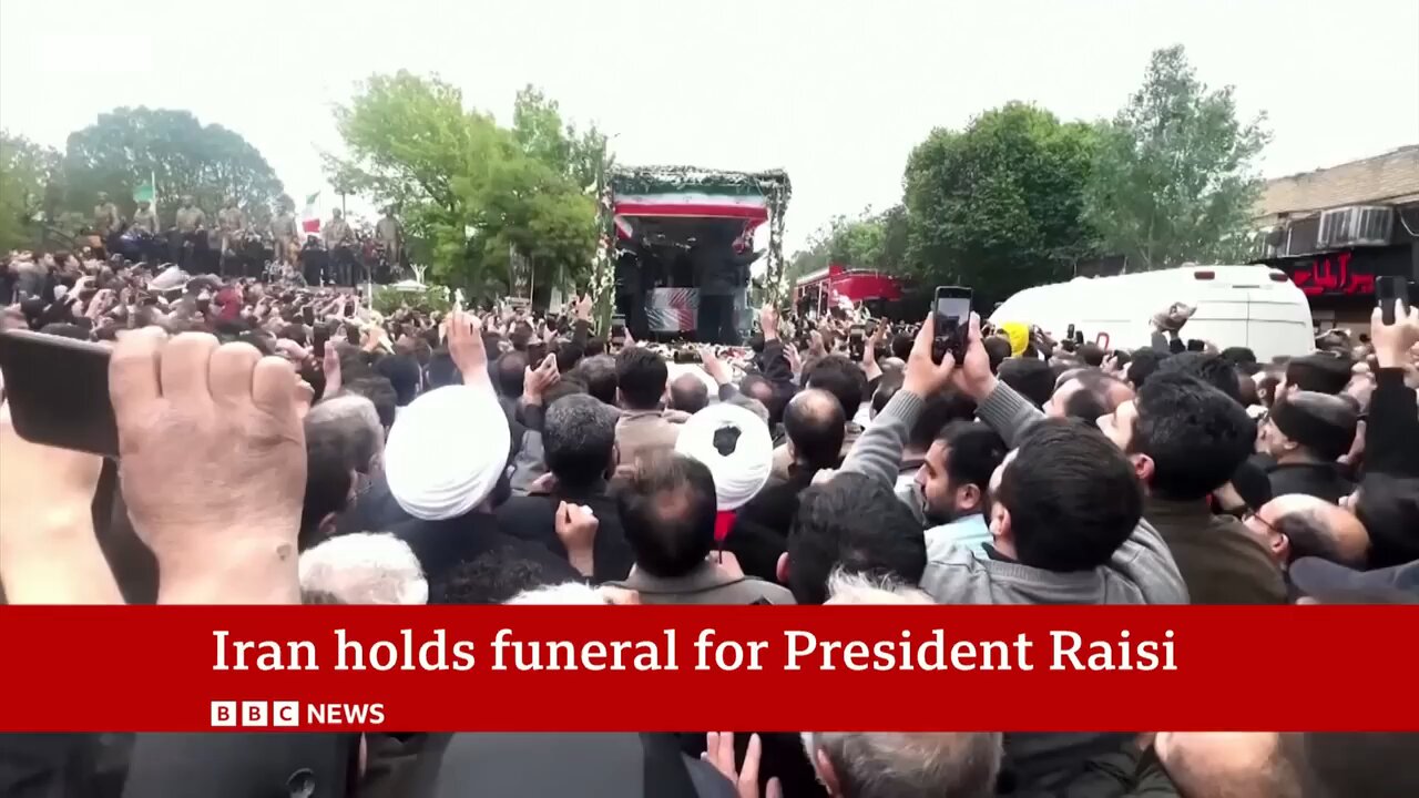 mourners in iran attend president raisi funeral