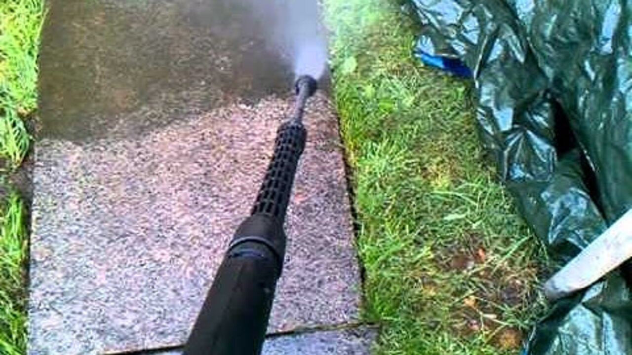 Slabs cleaning using pressure washer by handyman