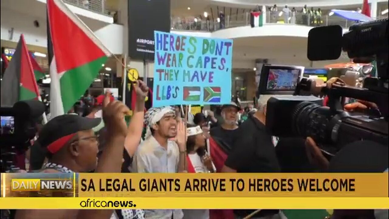 South African legal delegation receives “heroes’ welcome” at Johannesburg airport