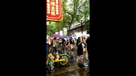 "Enchanting Rainy Rumble: Exploring the Splendor of Chinese Streets Amidst the Downpour!"