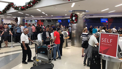 Finding bags, IDs, items left behind proves diffucult for passengers stranded after airport shooting