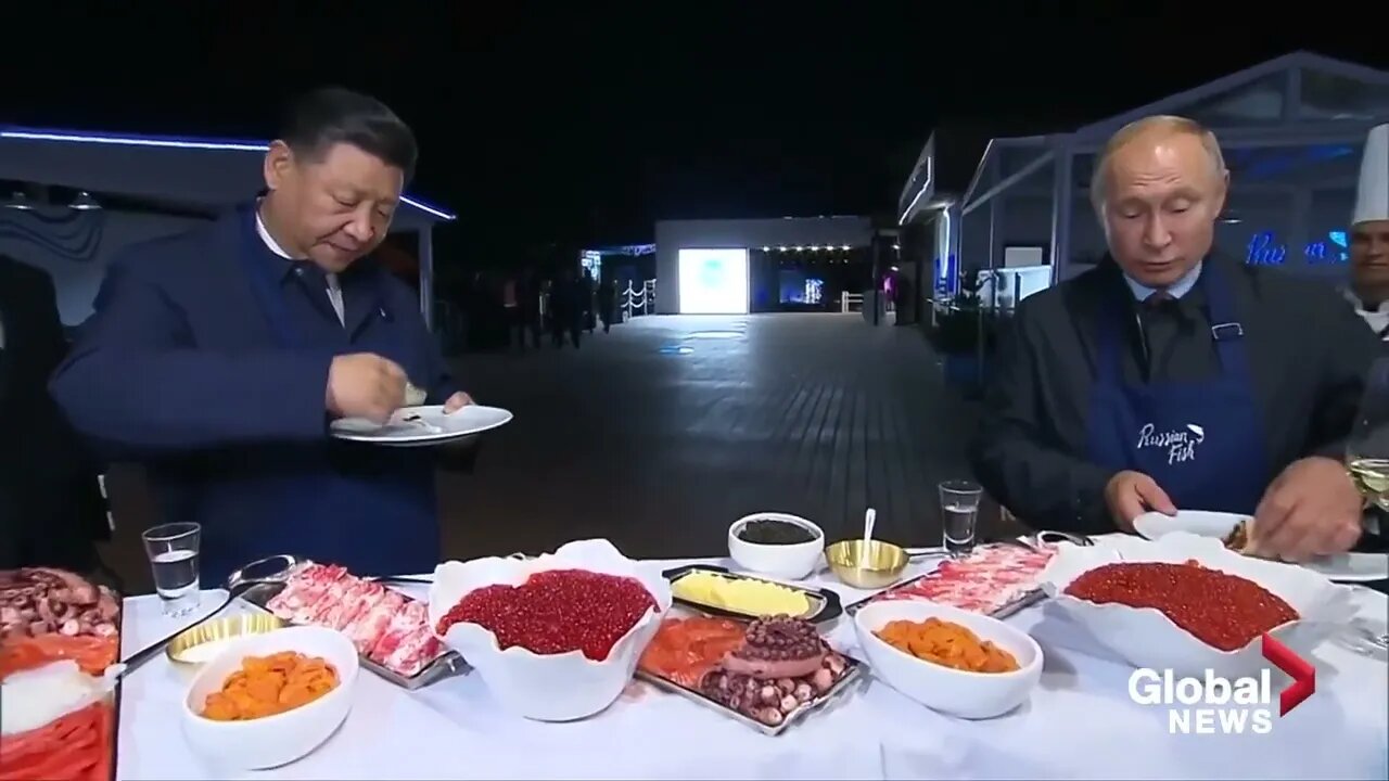 Vladimir Putin and Xi Jinping treat themselves with pancakes and vodka.