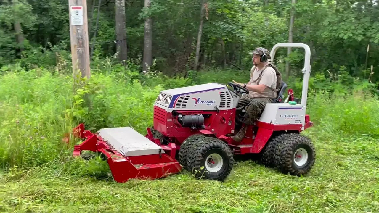 Diesel Ventrac 4500Y Mowing in the rain in the woods and mud kind of.