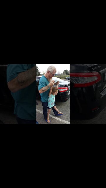 Bella Giggles Walking on Grandpa's Feet