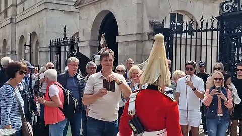 scared tourist waits for the guard to pass #horseguardsparade