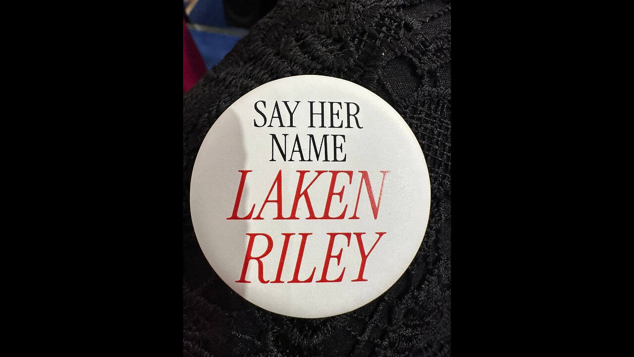 🚨SAVAGE MTG hands Joe Biden a Laken Riley pin and tells him to “SAY HER NAME!”