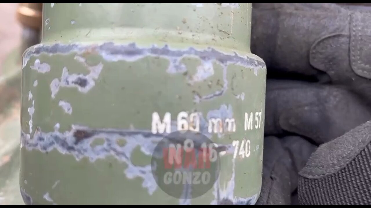 The fighters of the Somali battalion of DPR present another trophy - a NATO mortar of Polish origin M57