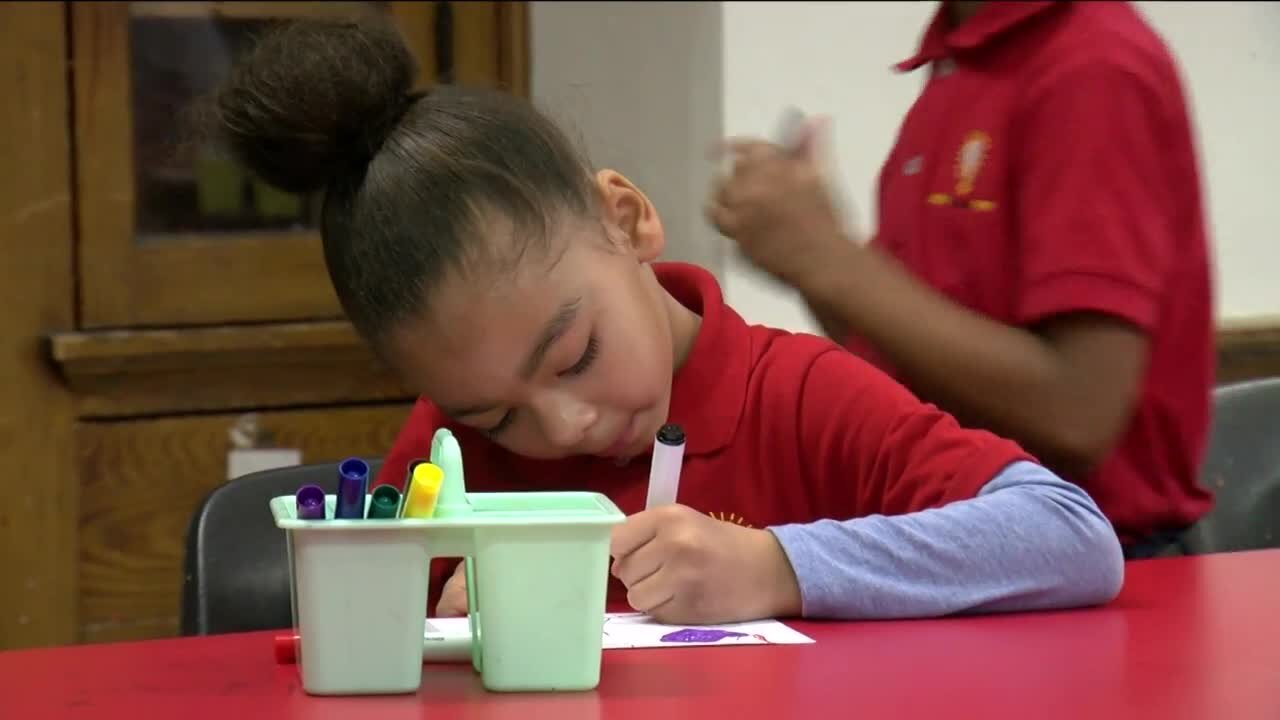 First grade students decorate ornaments for Milwaukee County Courthouse Christmas tree