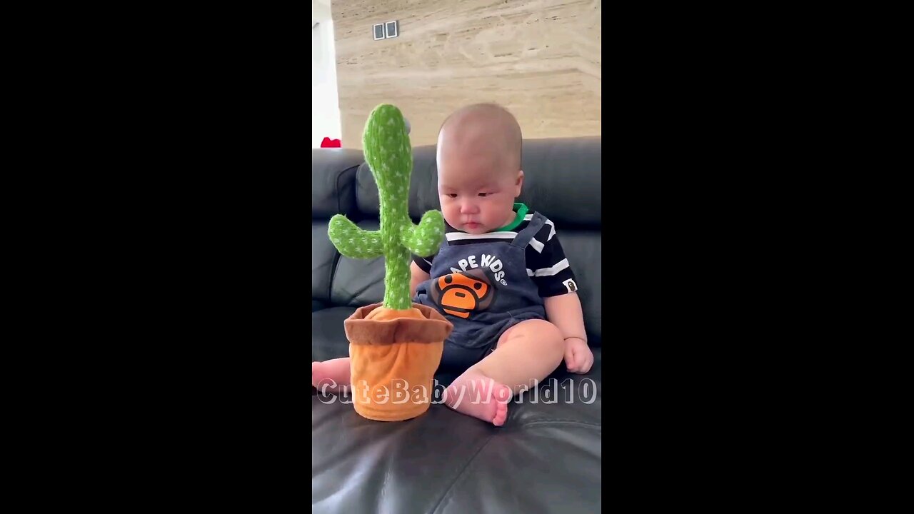 "Babbling Buddies: Sweet Baby Meets Talking Cactus for the First Time!"