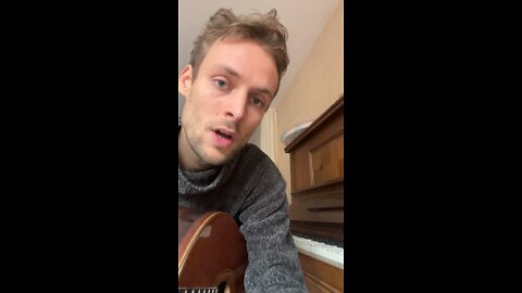 Playing Guitar and Piano at once