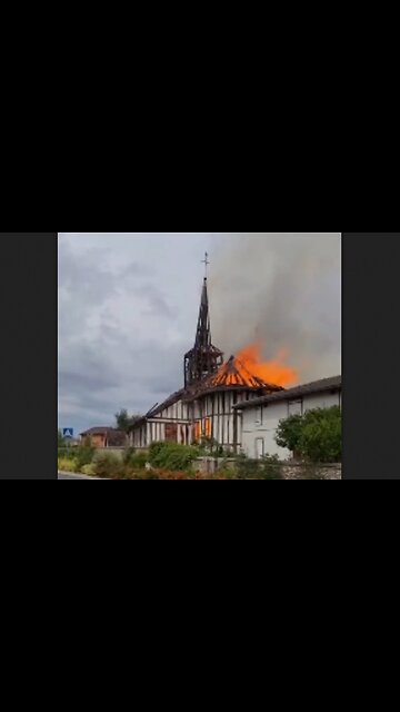 France - 16th century Catholic Church burned - The Steeple of Eglise Notre Dame Drosnay