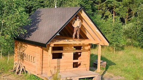 Alone, building an off grid log cabin for recreation