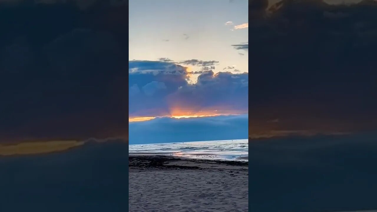 Cloud sandwich with the sun