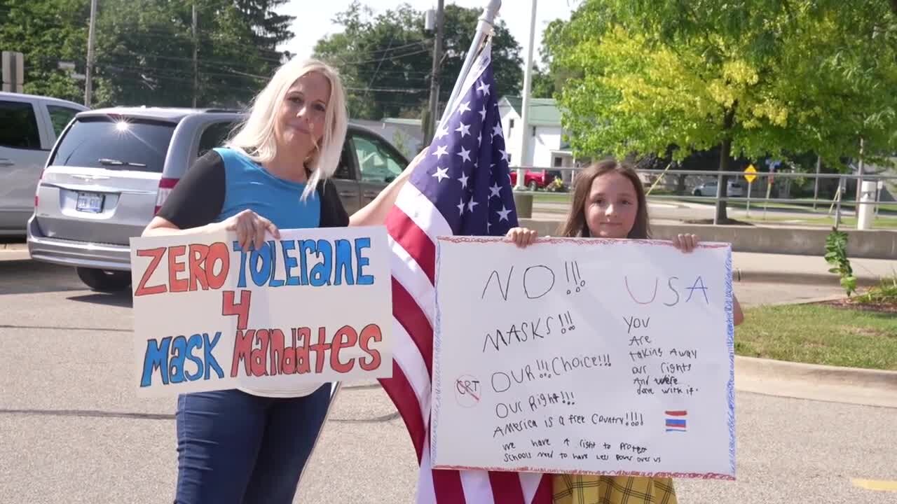 About 40 people gathered outside Grand Ledge Public Schools administration building for an anti mask mandate protest on Monday.