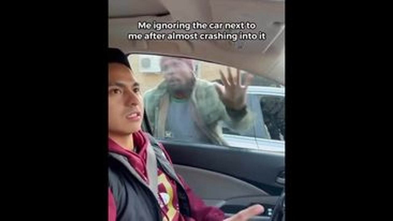 IGNORING THE CAR NEXT TO ME AFTER ALMOST CRASHING INTO IT