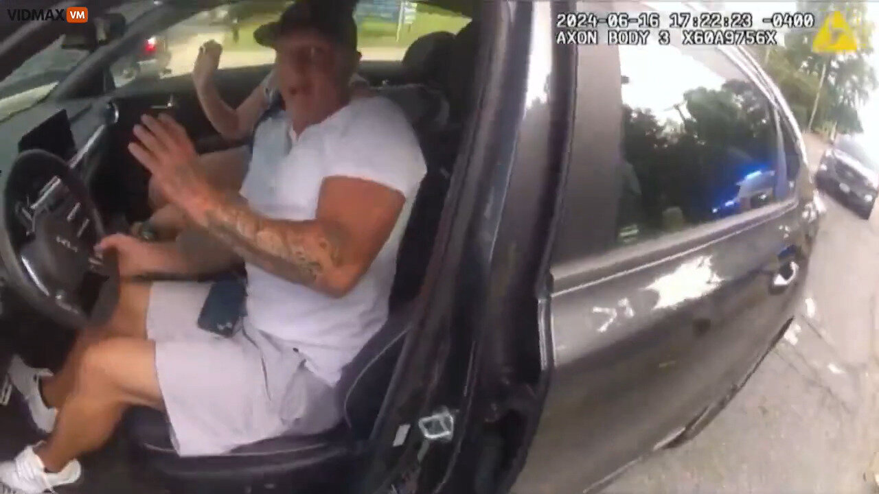 Poorly Trained Female Cop Pulls Gun And Fires At Man Who Is Not A Threat In His Car