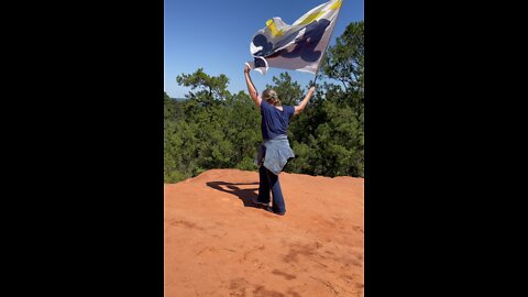 Red bluff with Jesus banner