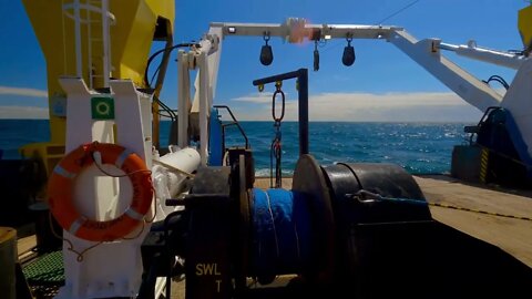 Winch wire appears on deck.